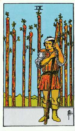 El arcano menor del 9 de bastos del tarot de Rider-Waite